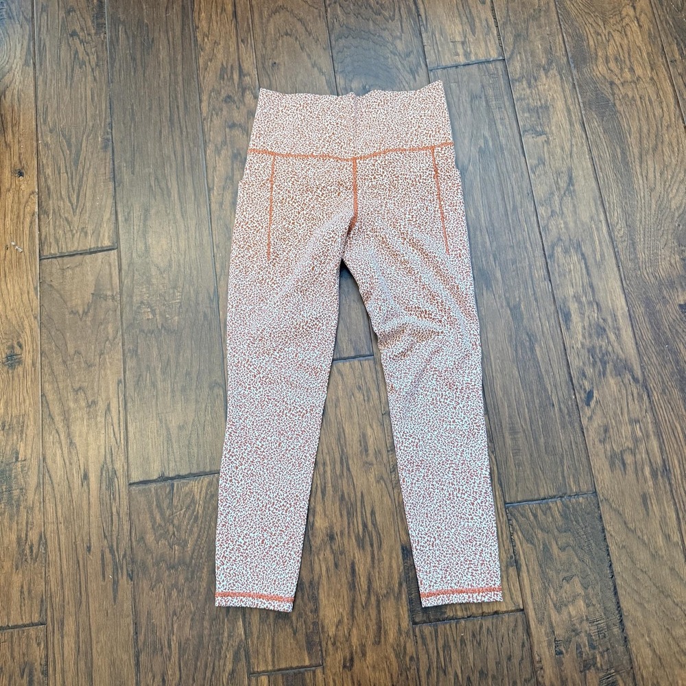 Athleta Salutation Stash II Textured Leggings Womens Small Brown Animal Yoga